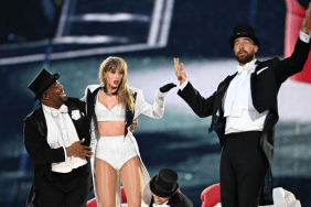 Taylor Swift is joined on stage by Travis Kelce (R), during "Taylor Swift | The Eras Tour" at Wembley Stadium on June 23, 2024 in London, England.